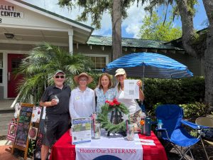 Chapter Volunteers hosted a Wreath Across America table at a local community event.